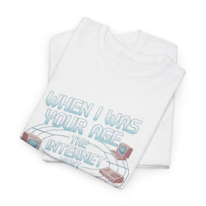 Chic folded graphic t-shirts showcasing the witty slogan 'When I Was Your Age the Internet Went Ska Wee Reweerrt', ideal for stylish layering and a playful nod to retro internet culture.