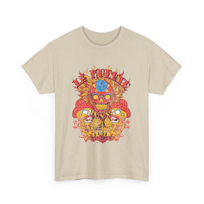 Luxurious men's t-shirt showcasing a vibrant sugar skull design inspired by the Day of the Dead, featuring intricate details in a striking reddish-orange tone, embellished with a light-blue flower and dynamic swirling flames.