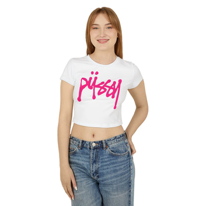 Model wearing a chic white Cheeky Women’s Cropped T-Shirt featuring a striking hot pink graphic, embodying playful sophistication and comfort.