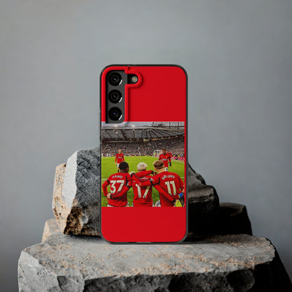 Stylish presentation of the Manchester United Mainoo Garnach Hojlund Soft Phone Case on a rocky surface, epitomising luxury for devoted fans.