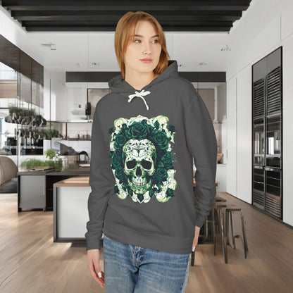 Model showcasing a luxury unisex lightweight hooded sweatshirt with a skull and roses design, radiating sophistication within a modern kitchen setting.