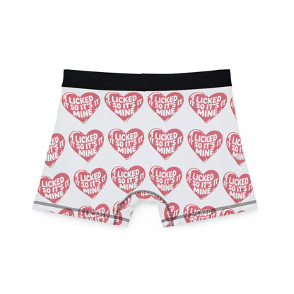 Back view of Valentines Naughty Cheeky Men's Boxer Briefs with red heart design proclaiming 'I LICKED IT SO IT'S MINE', perfect for adding a touch of cheeky luxury to your intimate apparel.