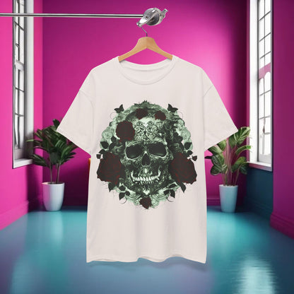 Elegant display of the Skulls and Roses Cotton Tee, a unisex graphic shirt featuring intricate skull and rose design, showcased against a vibrant pink background, perfect for edgy fashion enthusiasts.