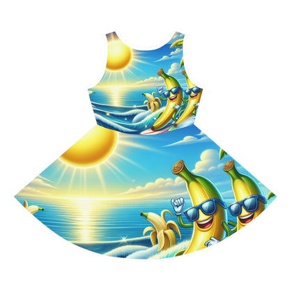Playful and stylish Sophie Rosendale 2 sundress by Dazzling Dreams Studio, adorned with cheerful banana surfers against a serene blue sky backdrop.