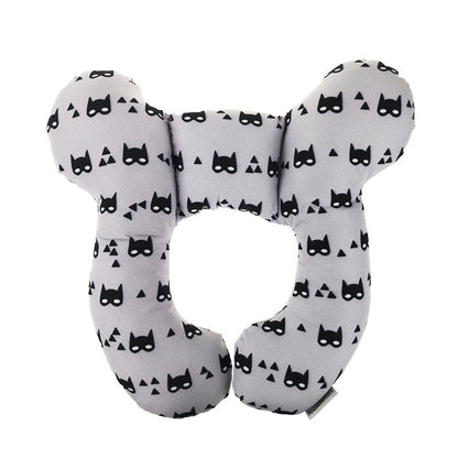 U-Shaped Infant Pillow by Dazzling Dreams Studio featuring a luxurious design with black superhero masks on a grey background, ideal for providing neck support and comfort for your baby in strollers, cribs, or playpens.