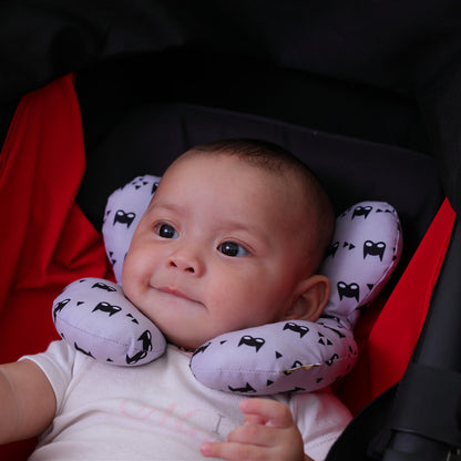 Chic U-Shaped Infant Pillow by Dazzling Dreams Studio, showcasing a baby comfortably nestled with the pillow in a stroller, enhancing safety and relaxation.