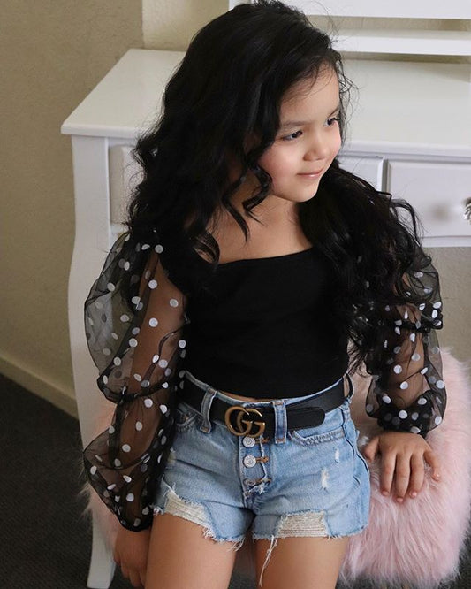 Stylish children's clothing featuring a Children's Clothing Cotton Dot Mesh Sleeves Striped Top paired with ripped denim shorts, designed for playful elegance in kids' fashion. Perfect for ages 3 to 8, this chic ensemble is ideal for casual outings or special occasions.
