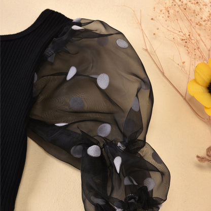 Cotton Dot Mesh Sleeves Striped Top from the Children's Clothing collection, showcasing a black top with elegant mesh sleeves adorned with playful dots, ideal for trendy kids.