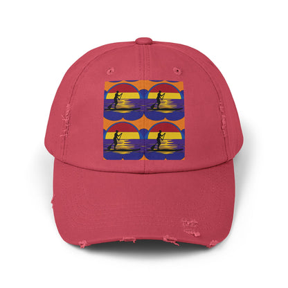 Unisex Distressed Paddleboarders Cap in pink, designed with a vibrant paddleboarding scene, combining luxury style and sun protection for water enthusiasts.