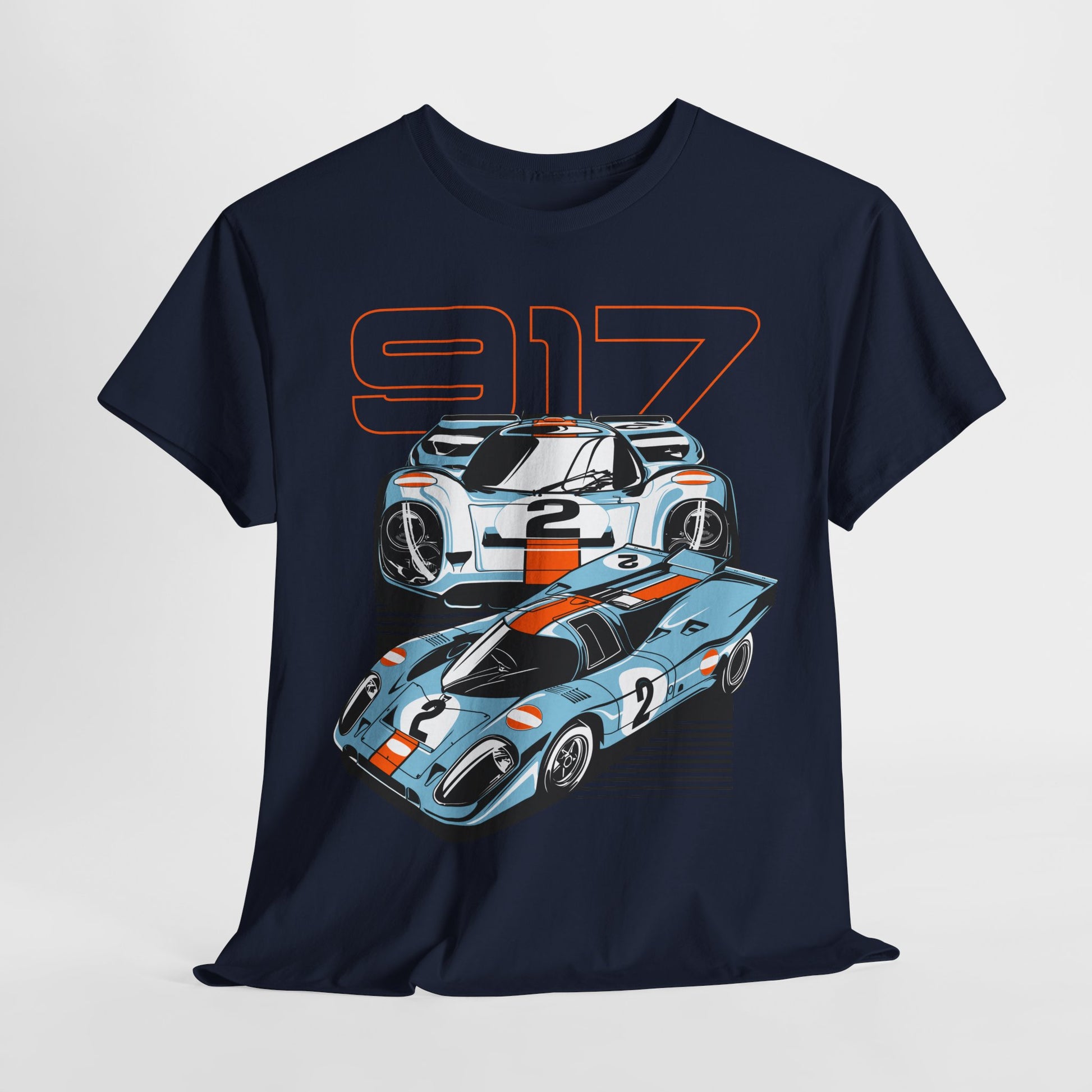 Elegant navy blue t-shirt displaying an illustration of Porsche 917 race cars, evocative of classic racing heritage and premium style.