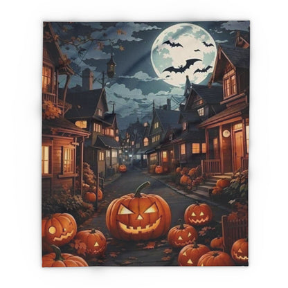 Decorative and Warm Halloween Spooky Arctic Fleece Blanket showcasing a delightful Halloween night scene with playful jack-o'-lanterns, a luminous full moon, and creeping bats, perfect for adding a touch of seasonal elegance.