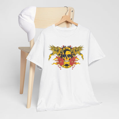 Chic white t-shirt draped over a stylish wooden chair, embellished with a vibrant yellow skull design, wings, and red floral accents, exuding a sense of daring fashion.