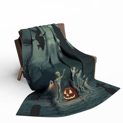 Stylish decorative and warm Halloween spooky Arctic fleece blanket elegantly draped over a chair, featuring playful ghosts and a cheerful jack-o'-lantern, ideal for creating a cozy atmosphere this Halloween.