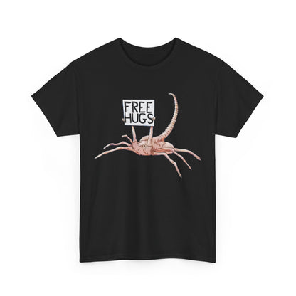 Alien Xenomorph Facehugger Free Hugs Graphic Unisex Graphic Tee Shirt featuring a playful facehugger design with a sign saying 'Free Hugs', set against a stylish black background.
