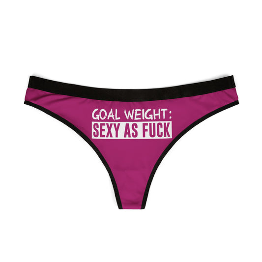Elegant women's thong in bright pink featuring the phrase 'Goal Weight: Sexy As Fuck', a perfect combination of style and sass for a flirtatious look.