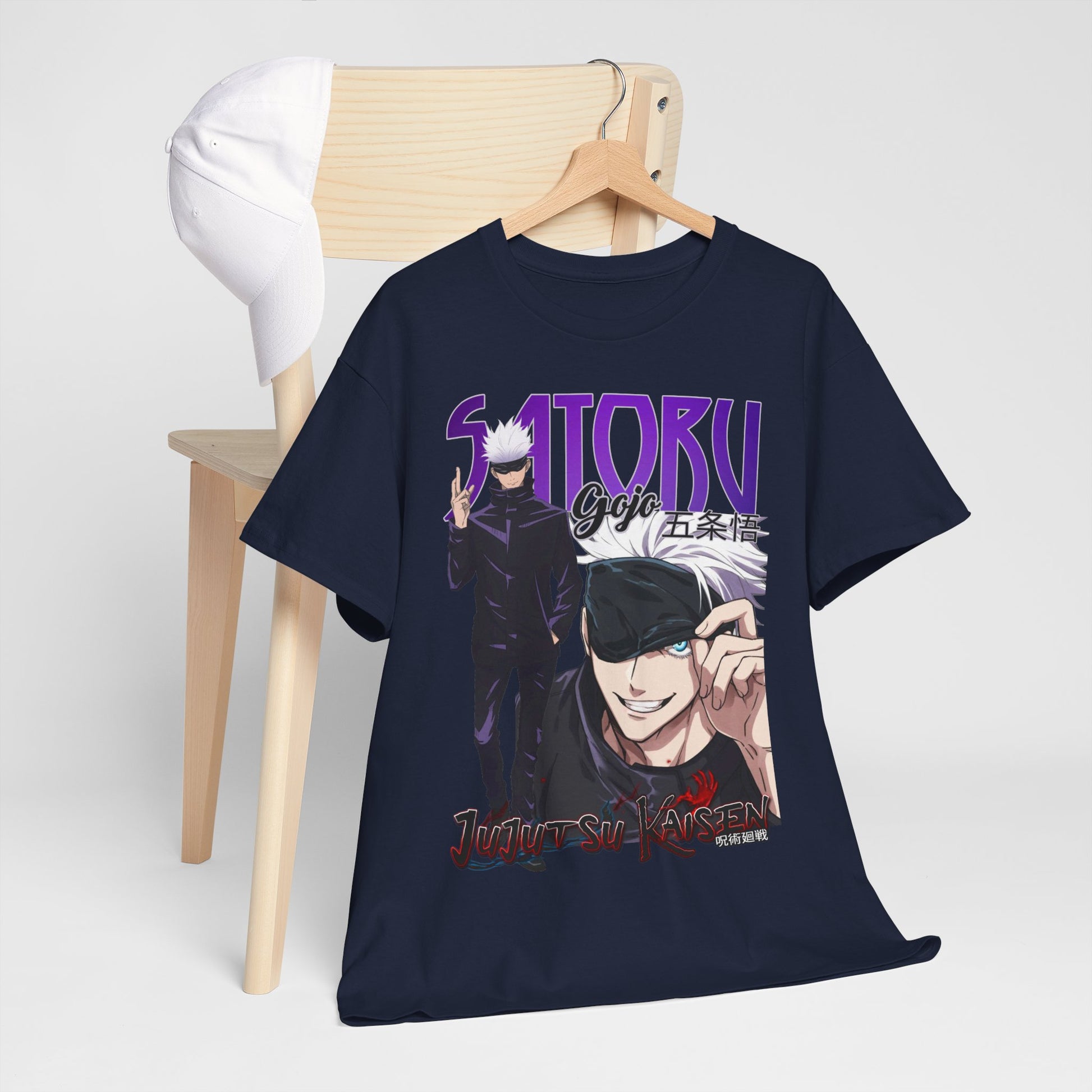 Chic navy t-shirt with a striking Gojo Satoru print, elegantly displayed alongside a white cap, ideal for a fashionable anime-inspired look.