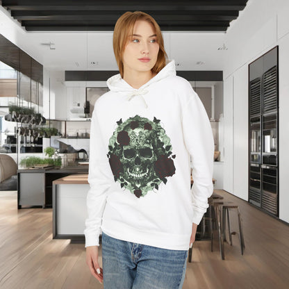 Model wearing a Unisex Lightweight Hooded Sweatshirt featuring a unique designer skull and roses graphic, perfect for stylish occasions. The sweatshirt exudes luxury and sophistication with its artistic design, showcased in a modern kitchen setting.