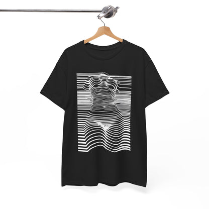 Black cotton t-shirt hanging on a wooden hanger, featuring a striking optical illusion graphic of a woman's silhouette, combining contemporary art with luxury attire.