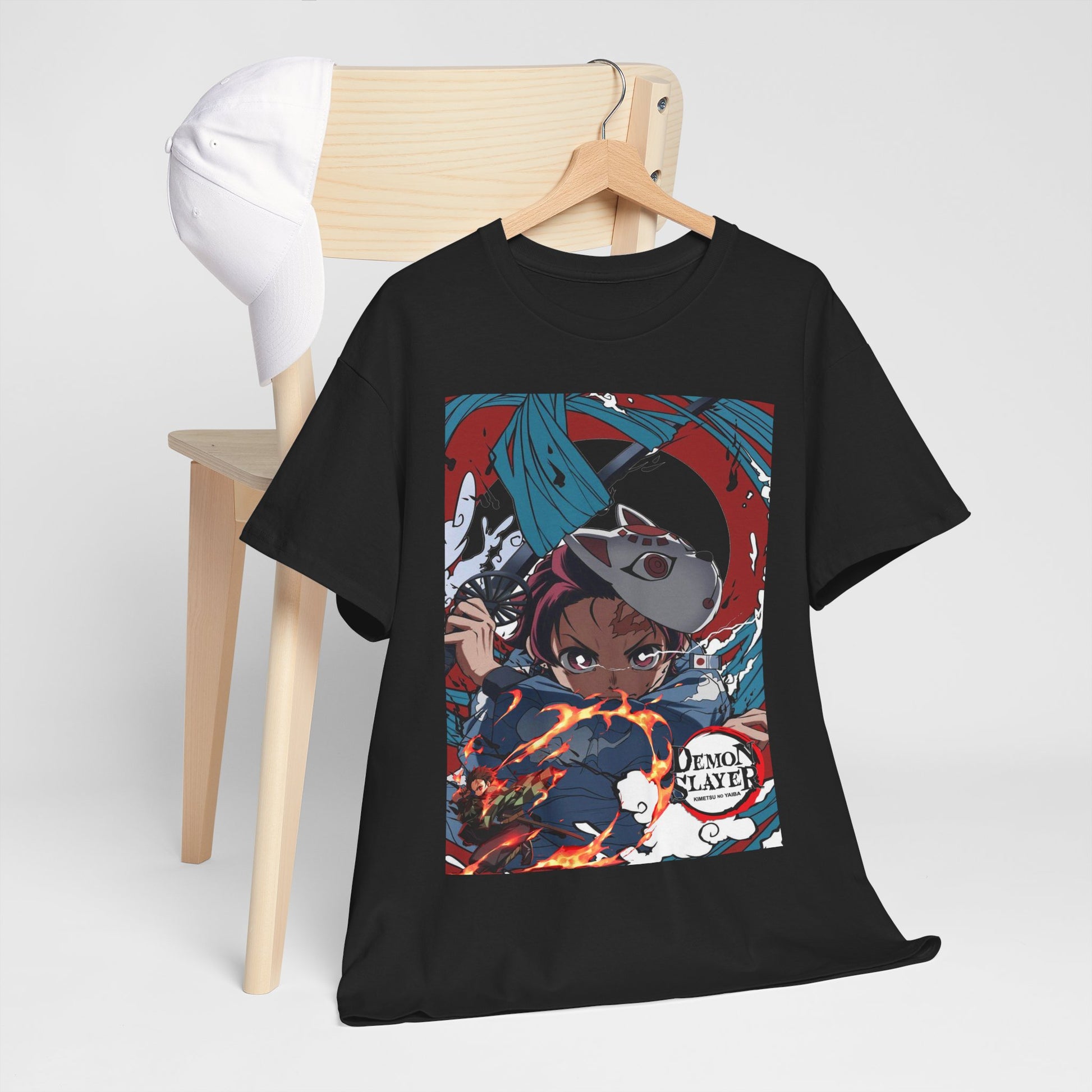 Chic black t-shirt on a wooden chair, adorned with a captivating Demon Slayer graphic, blending comfort and anime-inspired artistry.