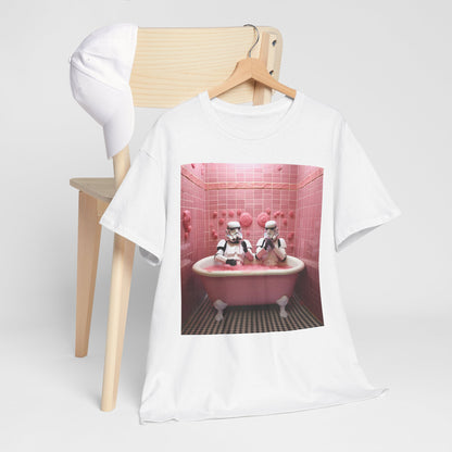 Trendy white t-shirt draped over a wooden chair, featuring an imaginative print of Stormtroopers indulging in a pink bathtub, blending humour with contemporary fashion.