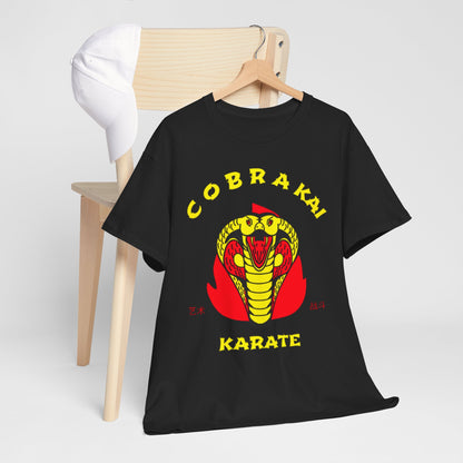 Sophisticated display of a black Cobra Kai graphic T-shirt elegantly draped on a wooden chair, offering a unique fashion statement.