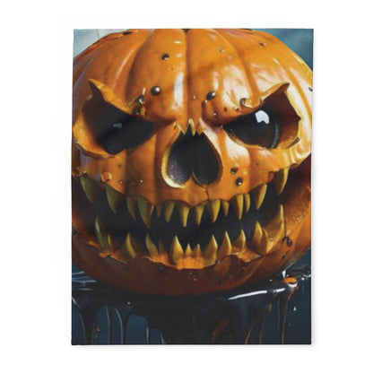 Decorative and Warm Halloween Spooky Arctic Fleece Blanket featuring a menacing jack-o'-lantern design with sharp teeth and glowing eyes. Ideal for Halloween decor.