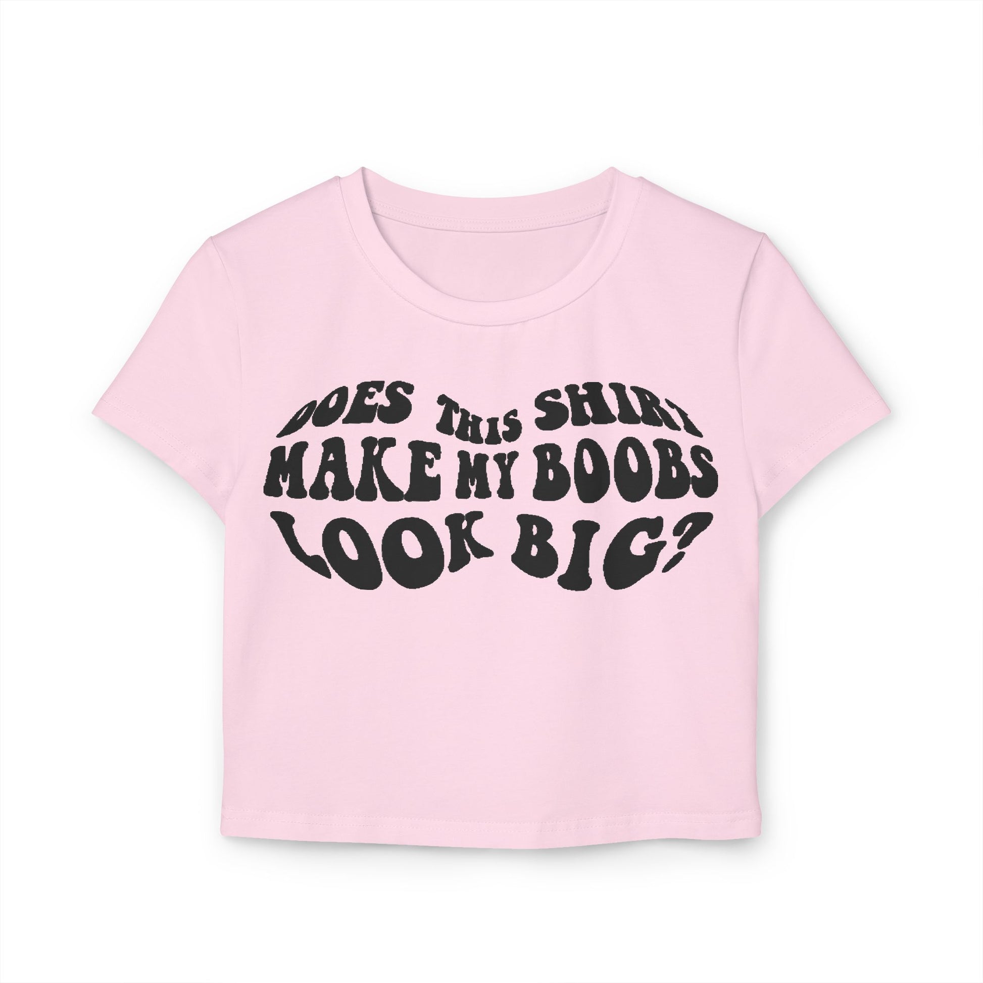 Stylish pink women's t-shirt with the amusing slogan 'Does This Shirt Make My Boobs Look Big?' presented in a vintage typography, perfect for casual outings and a touch of fun.