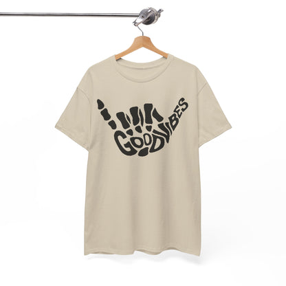 Luxurious men's t-shirt featuring a 'Good Vibes' skeletal hand gesture design, displayed elegantly against a minimalist backdrop, highlighting its edgy aesthetic.
