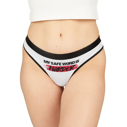 Luxury women's thong underwear in white featuring provocative text 'MY SAFE WORD IS HARDER' with a striking red paint-splatter effect, ideal for playful intimacy and romantic gifting.