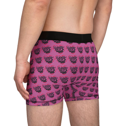 Reverse view of Valentines Naughty Cheeky Mens Boxer Briefs showcasing fun heart design and soft black waistband, an ideal choice for romantic occasions and light-hearted gifting.