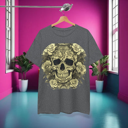 The Skulls and Roses Cotton Tee, Unisex Graphic Shirt displayed on a hanger in a vibrant room, emphasising its unique aesthetic.