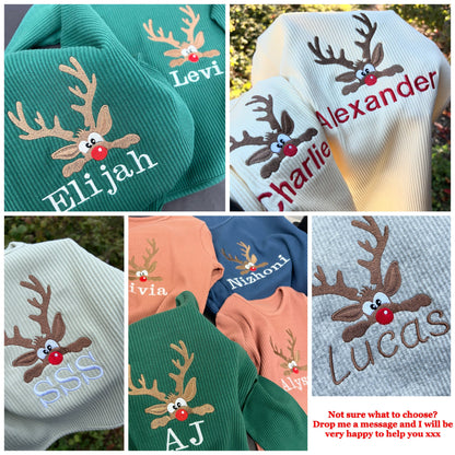 Custom embroidered family pyjamas from DreamBuy, featuring a charming reindeer design suitable for holiday gatherings.