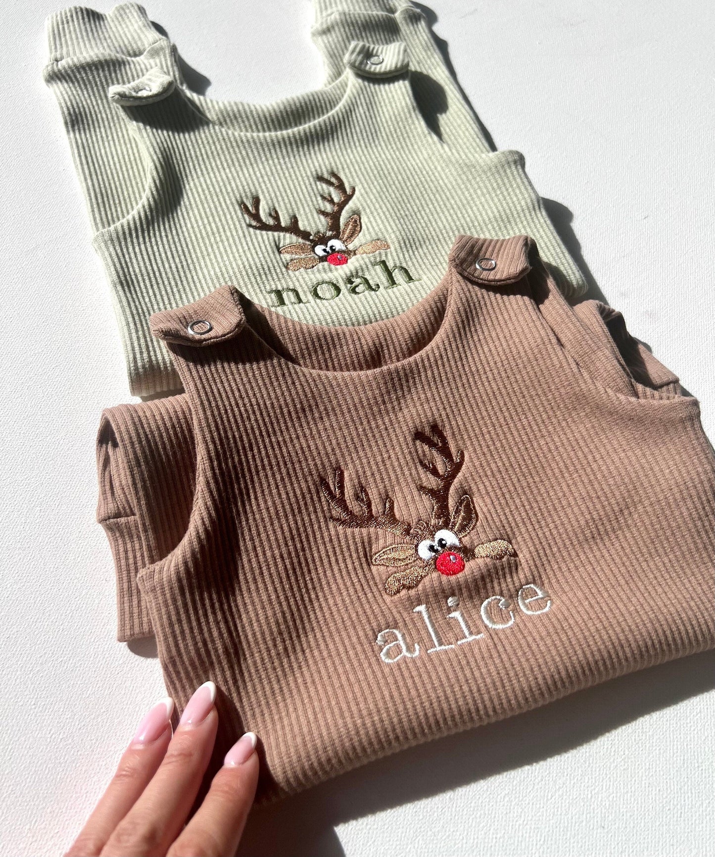 Soft and stylish luxury baby dungarees from DreamBuy with adorable reindeer embroidery, perfect for celebrating first Christmas.