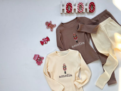 Luxurious personalized Nutcracker family lounge set by DreamBuy, featuring soft ribbed fabric and festive embroidery, perfect for holiday celebrations.