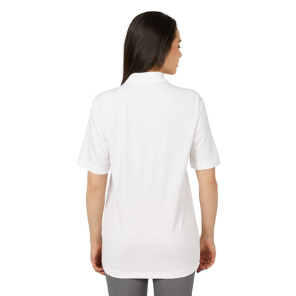 Chic back perspective of a model wearing the Adidas Unisex Performance Polo Shirt, crafted from eco-friendly materials, ideal for understated elegance.