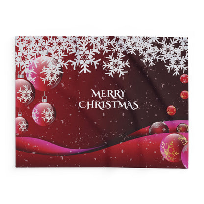 Charming Christmas Arctic Fleece Blanket displaying a vibrant winter motif with snowflakes and ornaments, ideal for enhancing seasonal decor.
