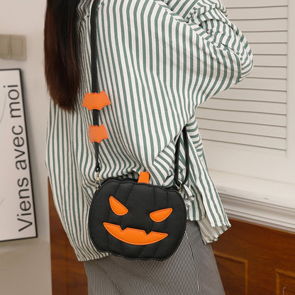 2023 Halloween Bags Funny Pumpkin Cartoon Shoulder Crossbody Bag showcasing a cute pumpkin design with bat embellishments, perfect for festive celebrations.