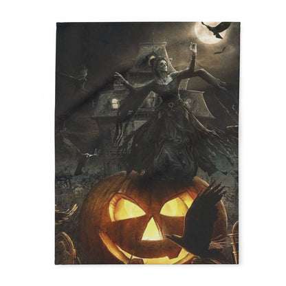 Decorative and Warm Halloween Spooky Arctic Fleece Blanket featuring a haunting scene with a dancing figure over a glowing jack-o'-lantern against a dark, gothic backdrop.