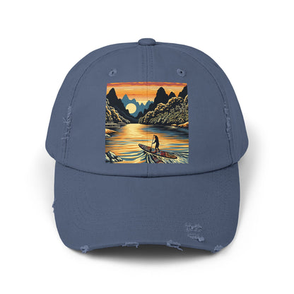 Unisex Distressed Paddleboarders Cap with Fantasy Design presented in a chic blue colour, featuring enchanting paddleboarding artwork that captures the thrill of luxurious water adventures.