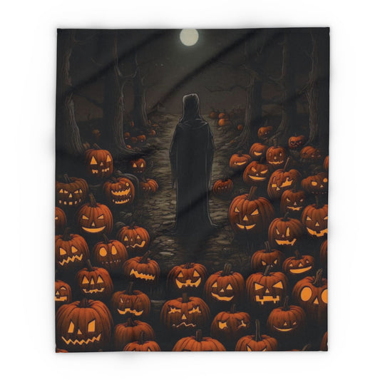 Elegant Decorative and Warm Halloween Spooky Arctic Fleece Blanket showcasing a mysterious figure surrounded by glowing jack-o'-lanterns, perfect for adding a touch of seasonal charm.