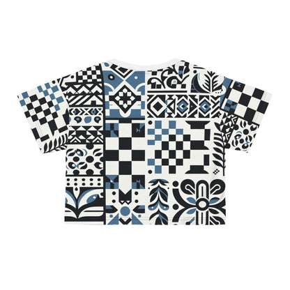 Artistic back design of the Lorelei Beaumont Trendy Crop Top, showcasing striking blue and black patterns on a light background, made from 100% silky-soft polyester.