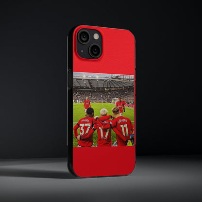Manchester United Mainoo Garnach Hojlund Soft Phone Case elegantly showcasing a vibrant design with players celebrating at Old Trafford, perfect for soccer fans.