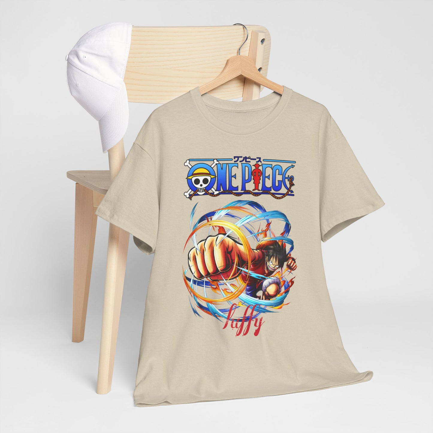 Chic men’s beige graphic t-shirt draped over a modern wooden chair, showcasing a lively illustration that embodies adventure and enthusiasm.