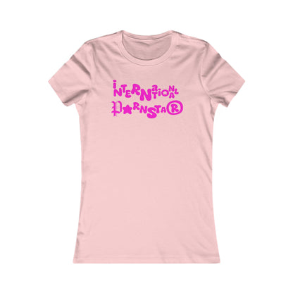 Chic fitted women's t-shirt in soft pink displaying the playful text 'International Superstar' in striking pink, an ideal addition for a confident wardrobe.