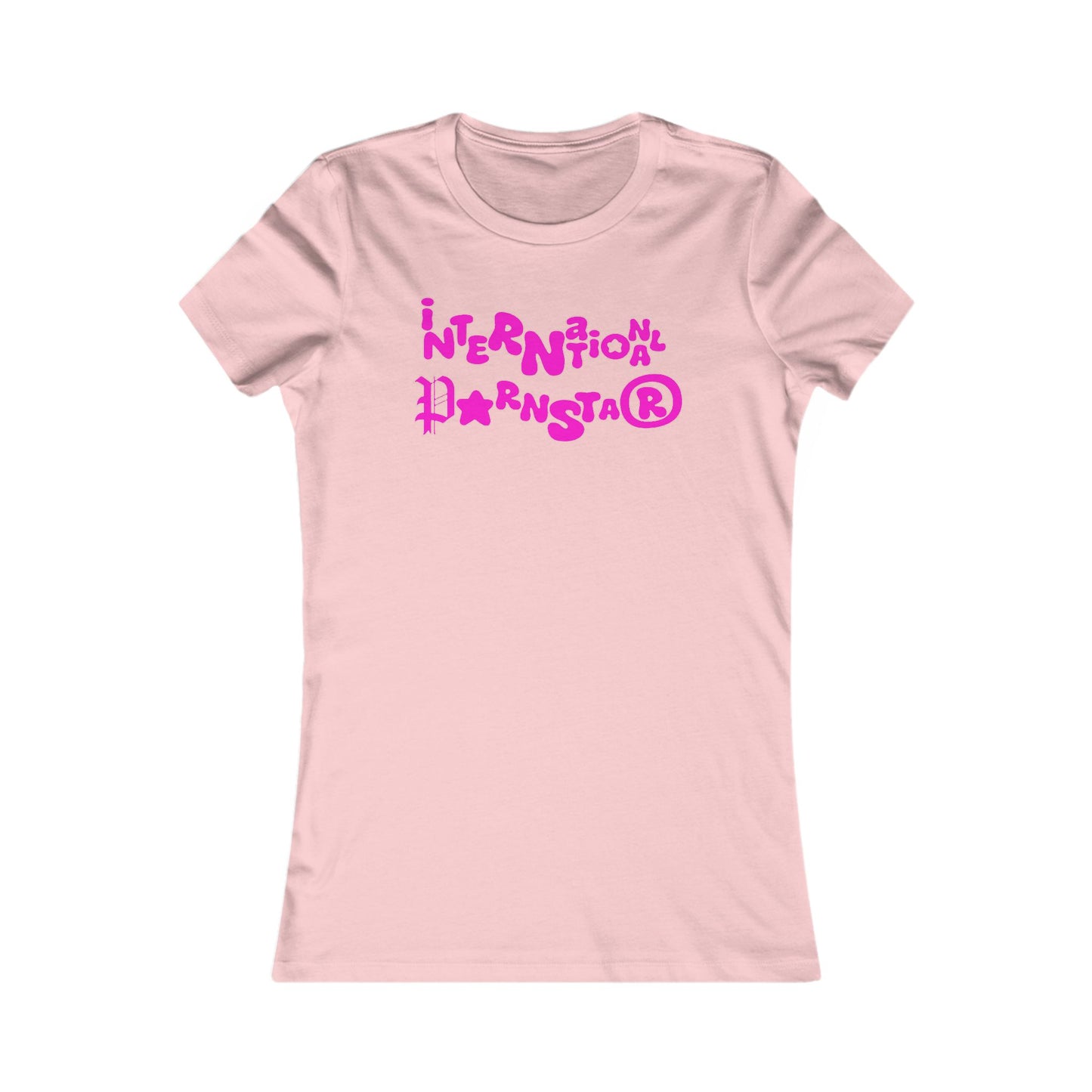 Stylish women's fitted t-shirt featuring the playful slogan 'International Superstar', designed in vibrant pink lettering against a soft pink background, perfect for adding a touch of humour and flair to your wardrobe.