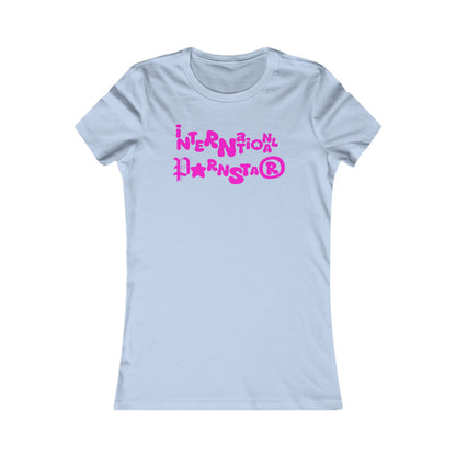 Refined women's fitted t-shirt adorned with the whimsical text 'International Superstar' in lively pink set on a soft blue canvas, a must-have piece for confident women who appreciate fashionable fun.
