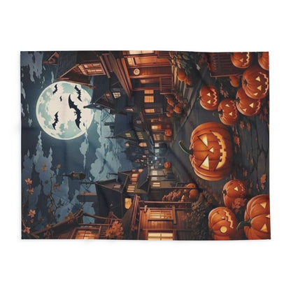 Artfully arranged Decorative and Warm Halloween Spooky Arctic Fleece Blanket featuring vibrant Halloween motifs, perfect for luxurious festive occasions.