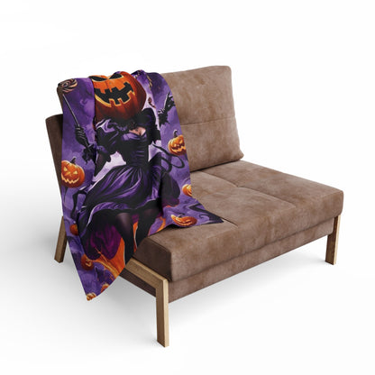 Luxury Decorative and Warm Halloween Spooky Arctic Fleece Blanket draped over a stylish brown sofa, featuring a captivating design with a pumpkin-headed witch and festive Halloween elements.