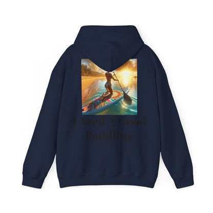 Fantasy Paddleboarding Unisex Hooded Sweatshirt featuring vibrant paddleboarding design with the phrase 'I Need A Good Paddling' on a navy background for a stylish outdoor adventure.