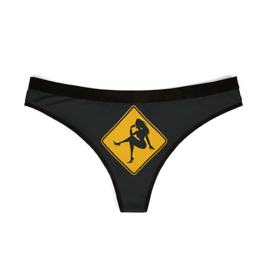 Chic women's thong with a bold silhouette graphic in a luxurious black fabric, perfect for adding a cheeky touch to intimate apparel.